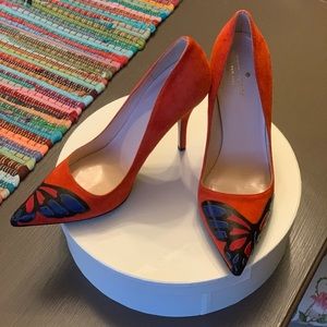 Orange/red Kate Spade pumps with butterfly detail